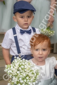 two young children at a wedding